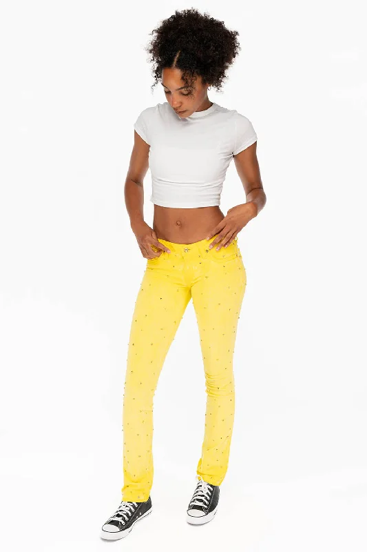 MARILYN LOW RISE WOMENS STUDDED STRAIIGHT LEG JEANS IN OIL YELLOW WITH TONAL WINGS AND CRYSTALS Polished Men's Satin MARILYN LOW RISE WOMENS STUDDED STRAIIGHT LEG JEANS IN OIL YELLOW WITH TONAL WINGS AND CRYSTALS Polished Men's Satin