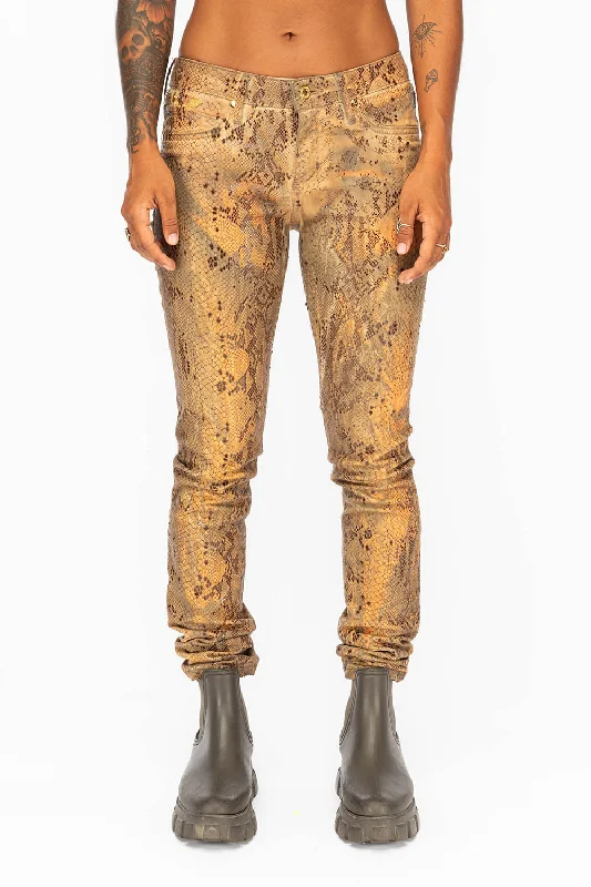 MID RISE WOMENS SKINNY JEANS WITH COBRA COATING Modern Men's Geometric